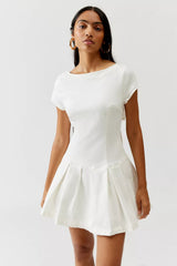 UO Bryan Bow-Back Pleated Drop Waist Denim Mini Dress